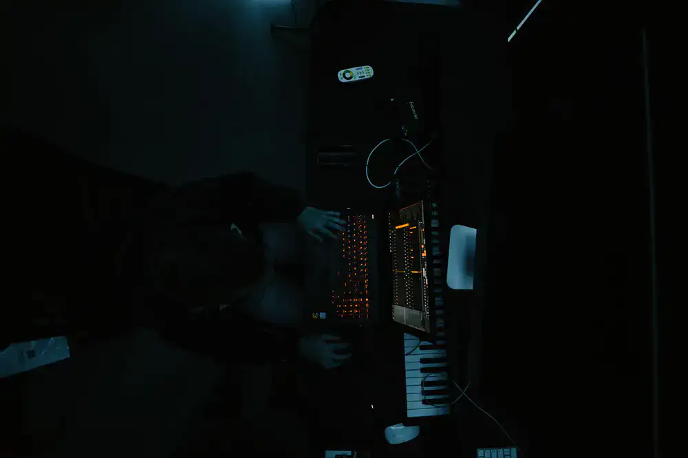 Solo developer composing music for a game
